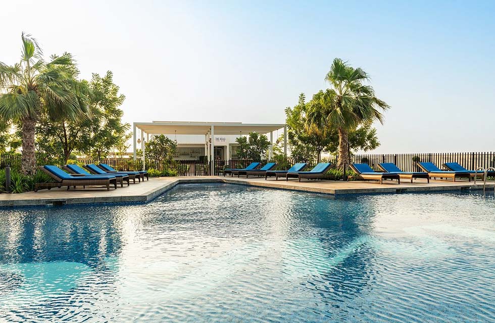 Pool and Beach Access with Food and Beverage for Two at Radisson Damac Hills