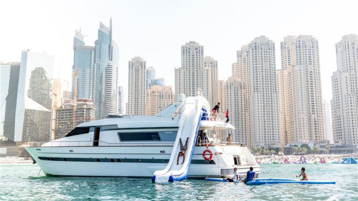 Half-Day Yacht Ride with BBQ - Slide & Swim! | Wondergifts.ae