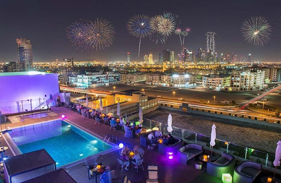 Sunset Dinner with House Drinks for Two at Estrellas Rooftop Lounge