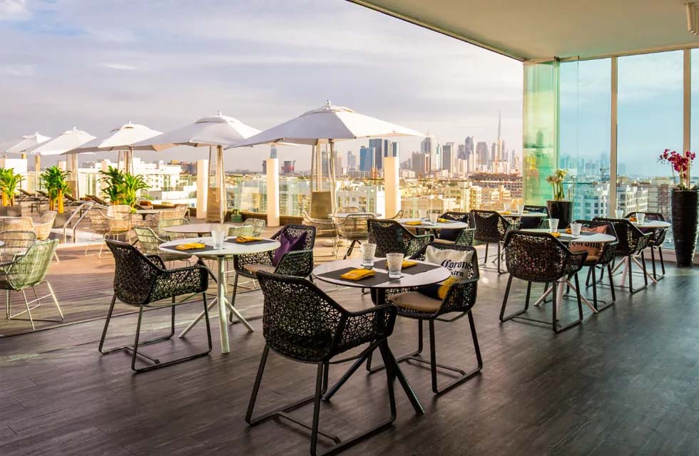 Sunset Dinner with House Drinks for Two at Estrellas Rooftop Lounge