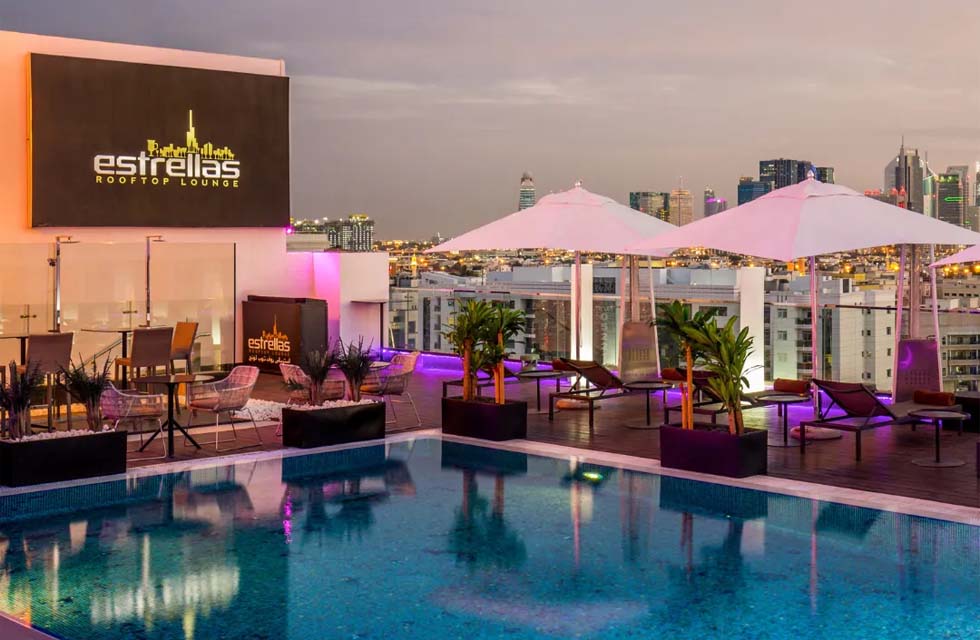 Sunset Dinner with House Drinks for Two at Estrellas Rooftop Lounge